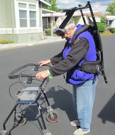 Female customer wearing the FaceDownWalker with a walker